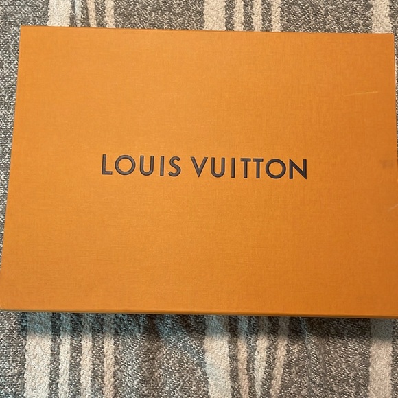Like new Louis Vuitton Neverfull Tote and hand wallet.